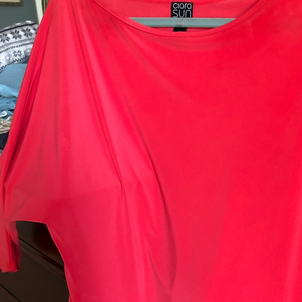 Coral color, flowy, dolman sleeve.